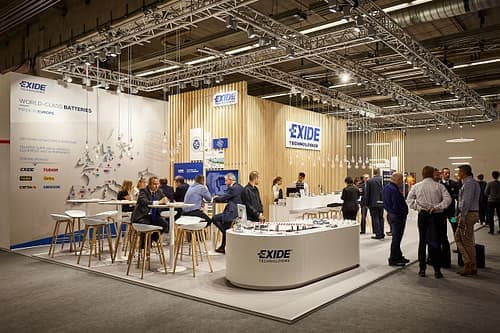 Exide exhibition stand with visitors