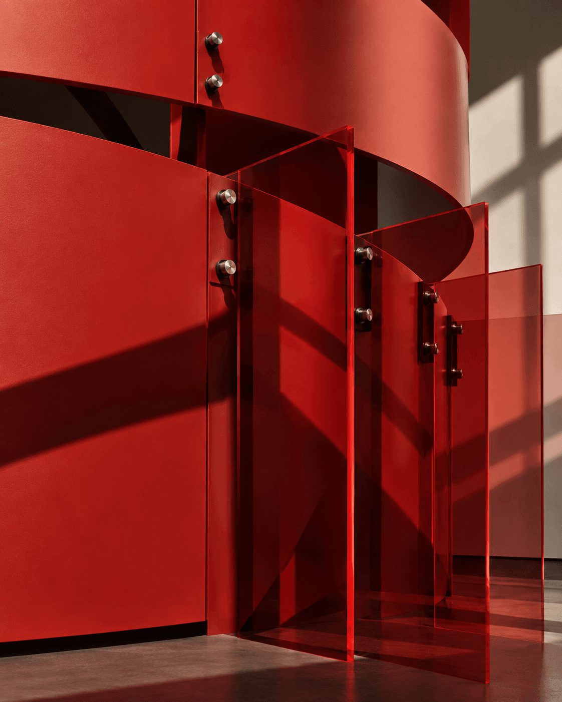 Close-up of reusable red architectural panels and connections